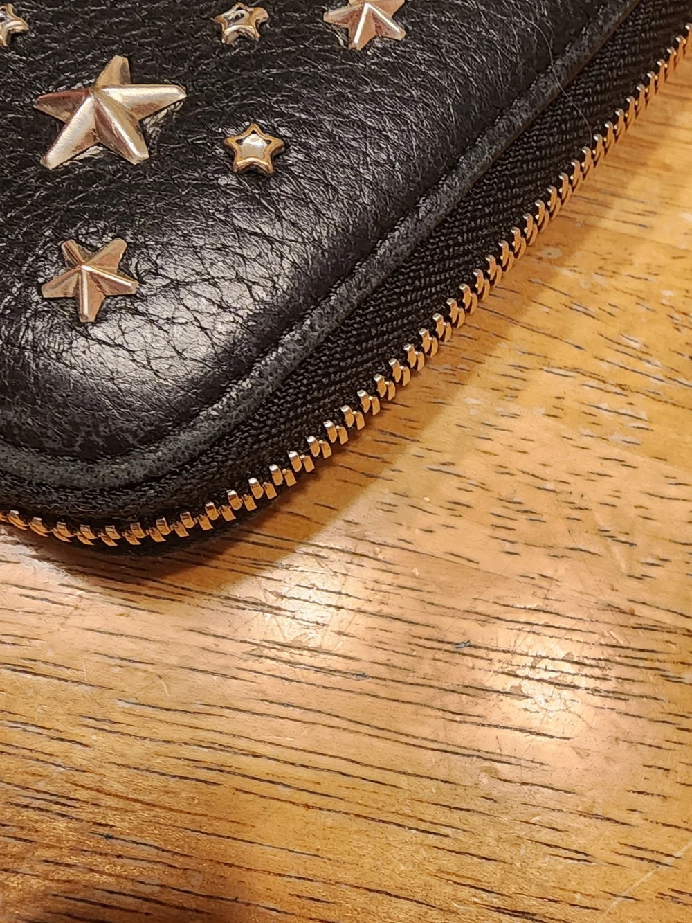 Jimmy Choo Filipa Star Studded Wallet, a black leather zip-around wallet